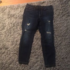 Mid-rise blue washed ripped jeans